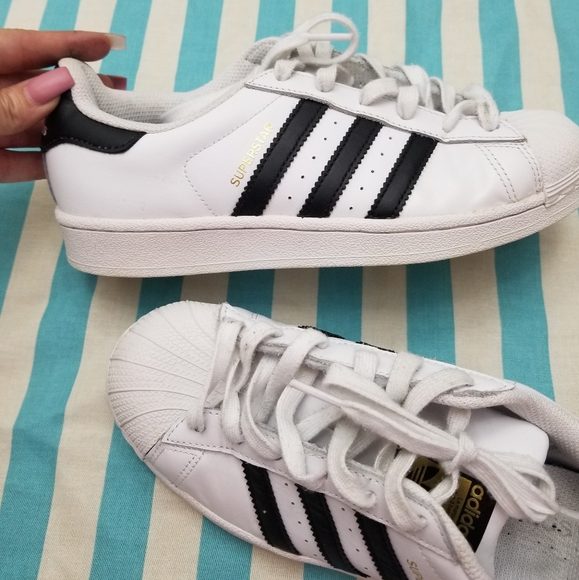 white adidas shoes with black stripes womens